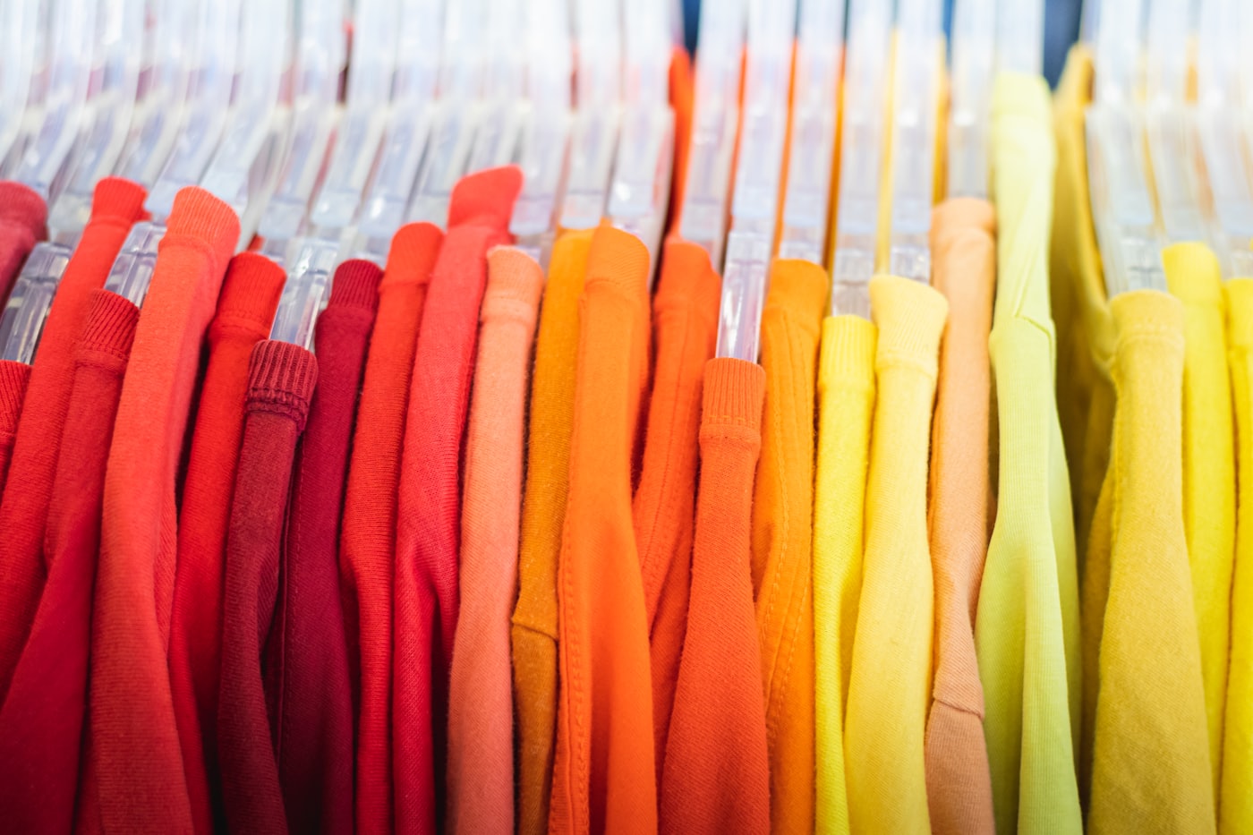 Rack of colourful folded garments
